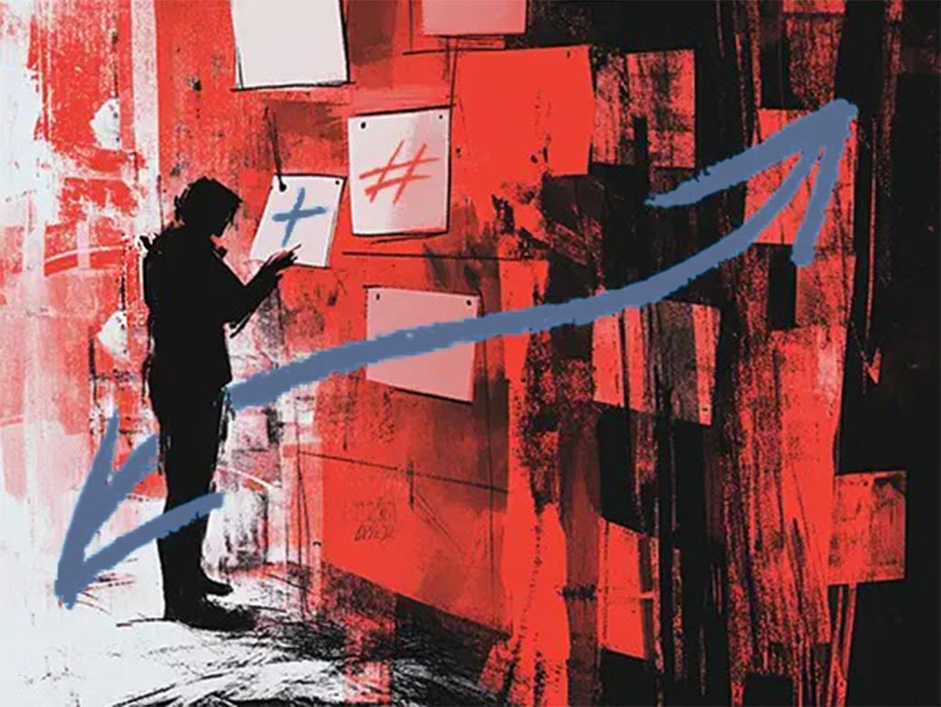 Brand Management Strategy A stylised image of a man looking at ideas pinned to a wall.