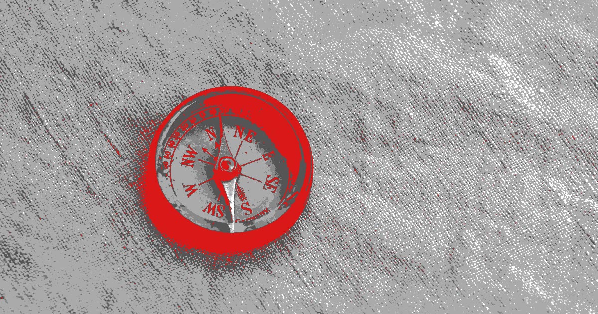 A stylised image of a red compass pointing north